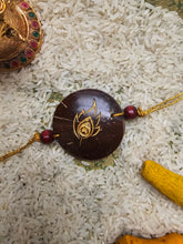 Load image into Gallery viewer, Coconut Shell Rakhi - Krishna
