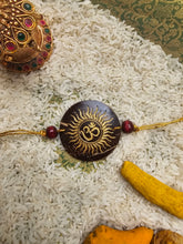 Load image into Gallery viewer, Coconut Shell Rakhi - Om
