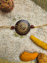 Load image into Gallery viewer, Coconut Shell Rakhi - Om
