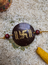 Load image into Gallery viewer, Coconut Shell Rakhi - Swasthik
