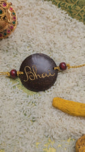 Load image into Gallery viewer, Coconut Shell Rakhi - Bhai (English)

