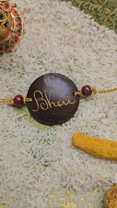 Coconut Shell Rakhi - Bhai (English)